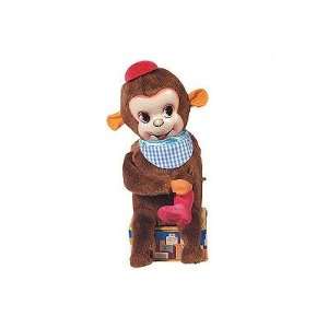  Tin wind up shoeshine monkey figurine