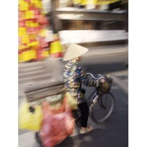 Man on Bike at Tet Festival, Ho Chi Minh City, Vietnam, Indochina 