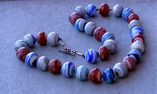   on a necklace made with vintage hand blown pasta beads in murano
