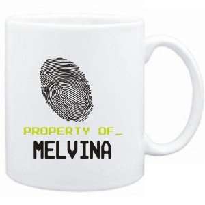  Mug White  Property of _ Melvina   Fingerprint  Female 