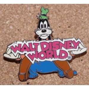  Disney Goofy sitting holding a Walt Disney World sign pin 