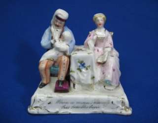   STAFFORDSHIRE FIGURINE WHEN A MAN MARRIES HIS TROUBLES BEGIN  
