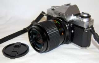 Minolta X 370 35mm SLR Film Camera with 70mm Lens, Cover Case 