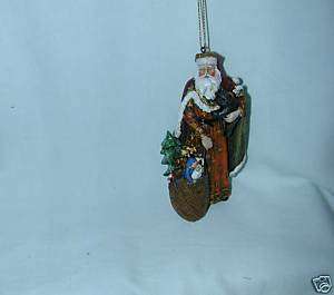 CHRISTMAS WISHES GIFT GIVER SANTA RESIN ORNAMENT NEW  