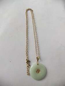 Fine Jade gold pendant on gold chain.  