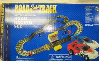 ROAD & TRACK BATTERY OPERATED RACING SET  