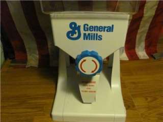 COMMERCIAL GENERAL MILLS CEREAL DISPENSER  CANDY NUTS OR?  