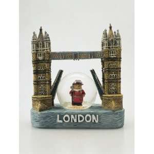  Close Up of a Tower Bridge Shaped Snow Globe with a 